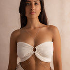Front view of the silver Sprinkle Diamond Body Chain worn on a model, styled over a ruched bandeau top with symmetrical draping over the torso.