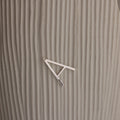 Large Sideways Initial Necklace in Sterling Silver showcased on a textured beige background.