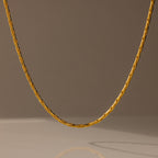 The Bold Link Chain Necklace in 18K Gold is displayed against a neutral, softly lit background.