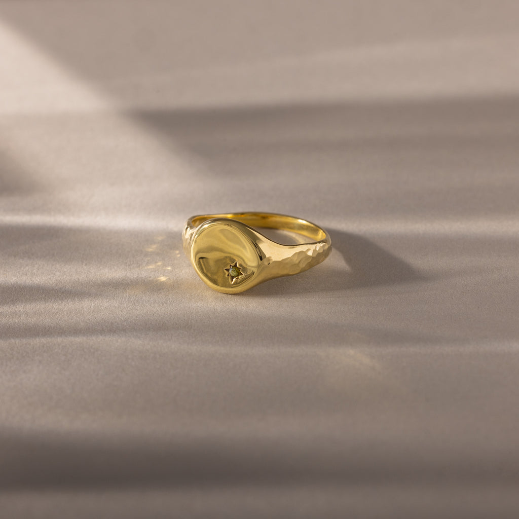 The North Star Peridot Signet Ring is perfect for those who appreciate symbolic jewelry with timeless elegance.