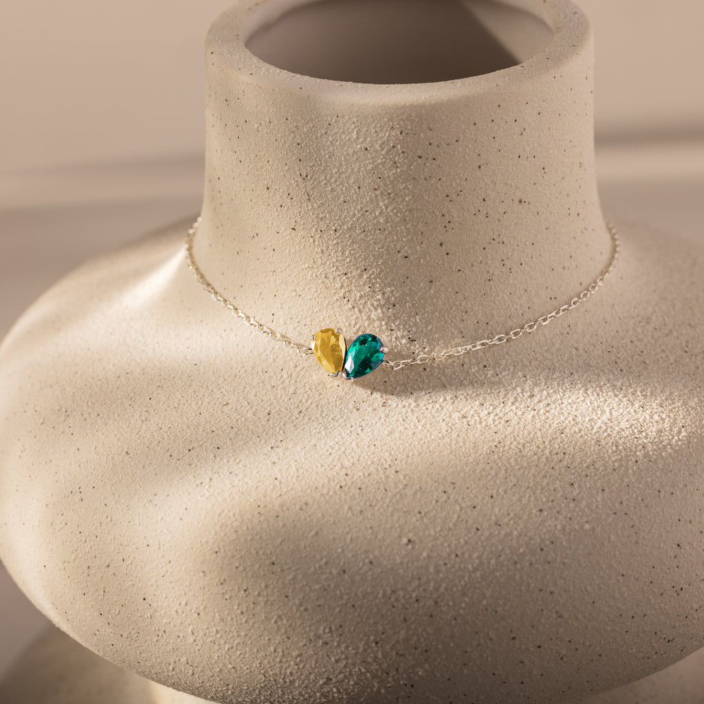 The Toi et Moi Teardrop Heart Bracelet is elegantly displayed on a mannequin.