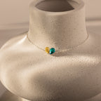 The Toi et Moi Teardrop Heart Bracelet is elegantly displayed on a mannequin.