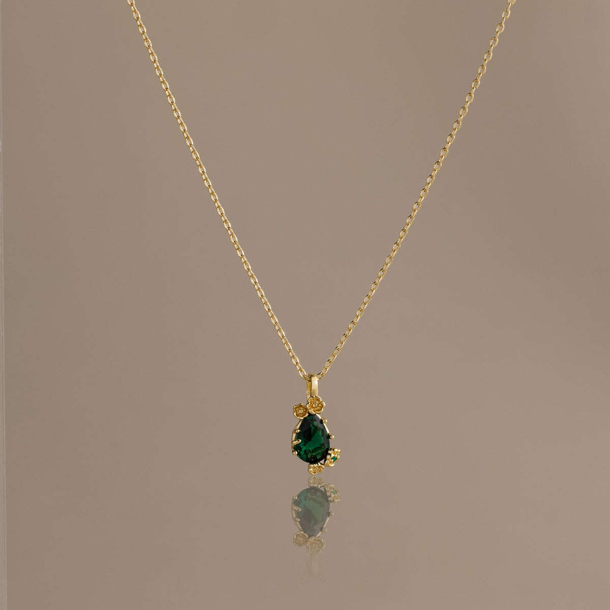 Emerald Blossom Charm Necklace