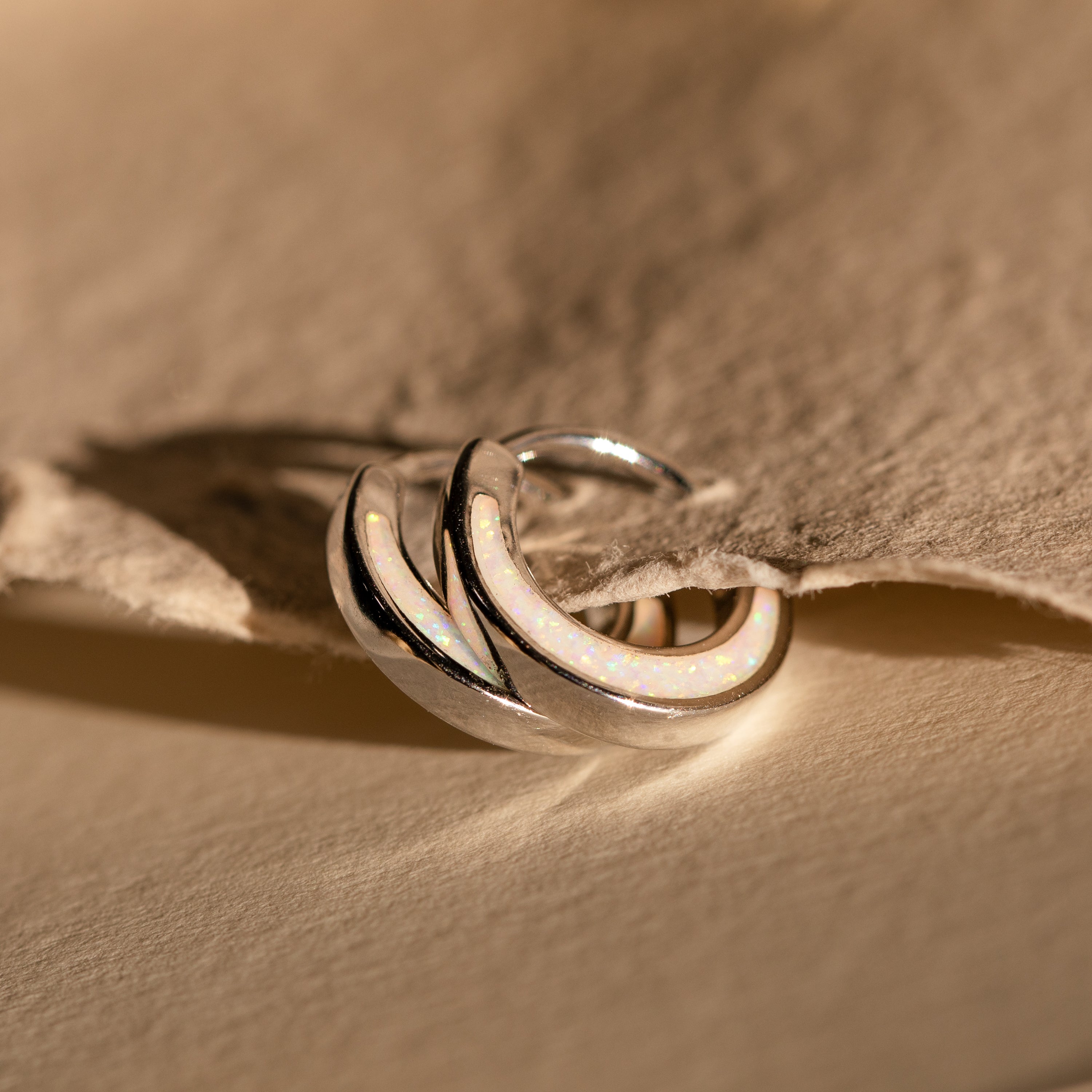 Crescent Moon Opal Huggies in Silver
