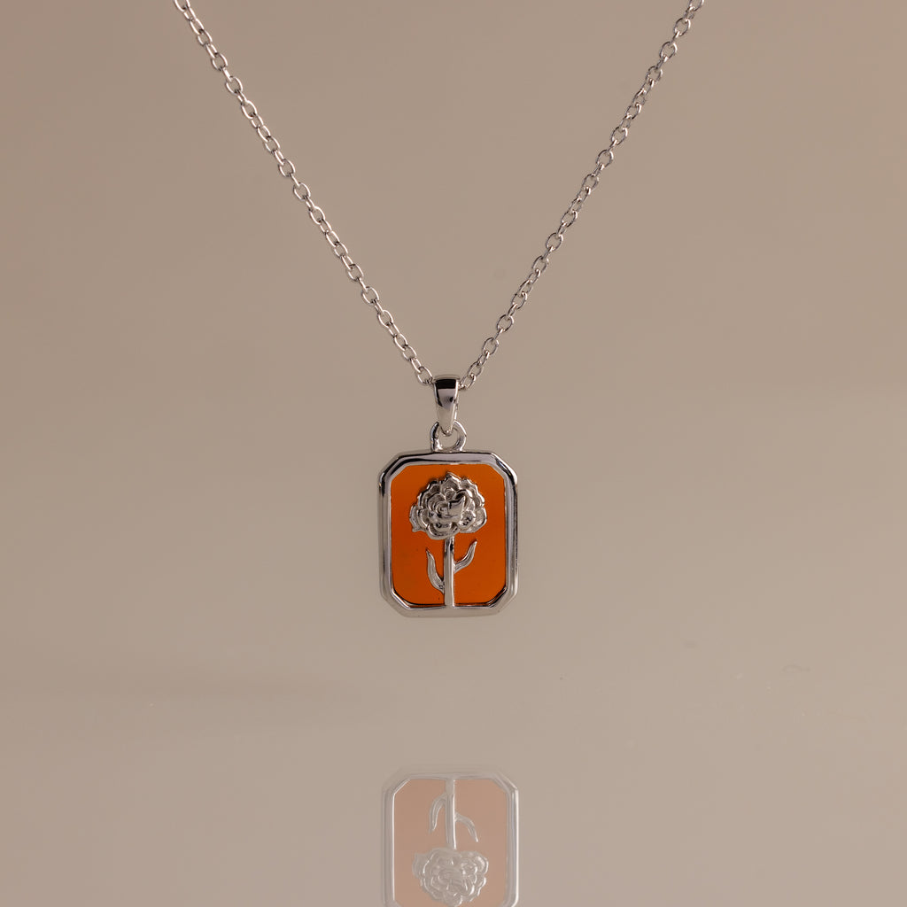 It seems you forgot to include the keywords. Please provide both the product description for the Garnet Birth Flower Charm Necklace inside [desc] and your list of keywords, and I’ll be happy to assist!.
