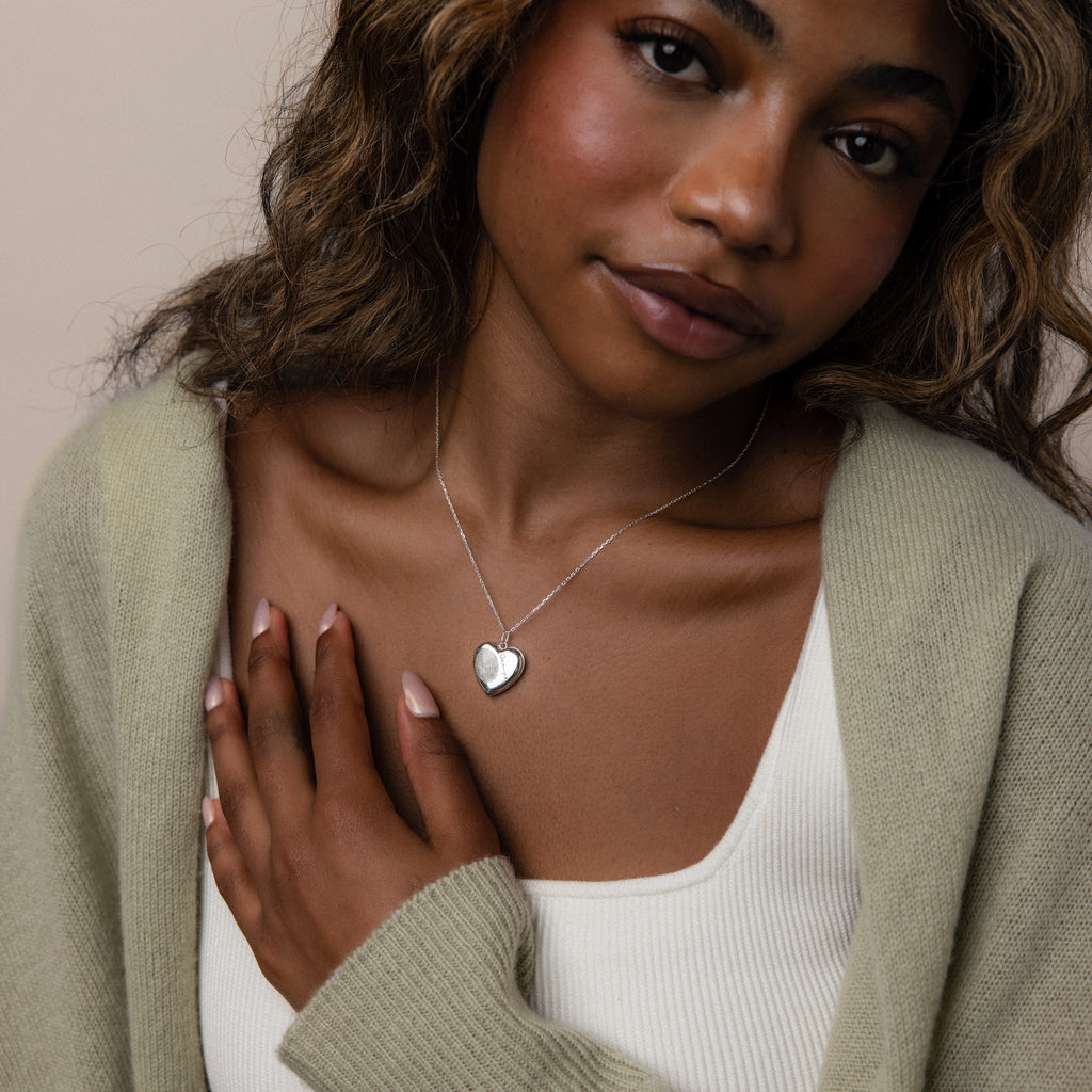 Image of model wearing our Fingerprint Heart Locket Necklace in Silver