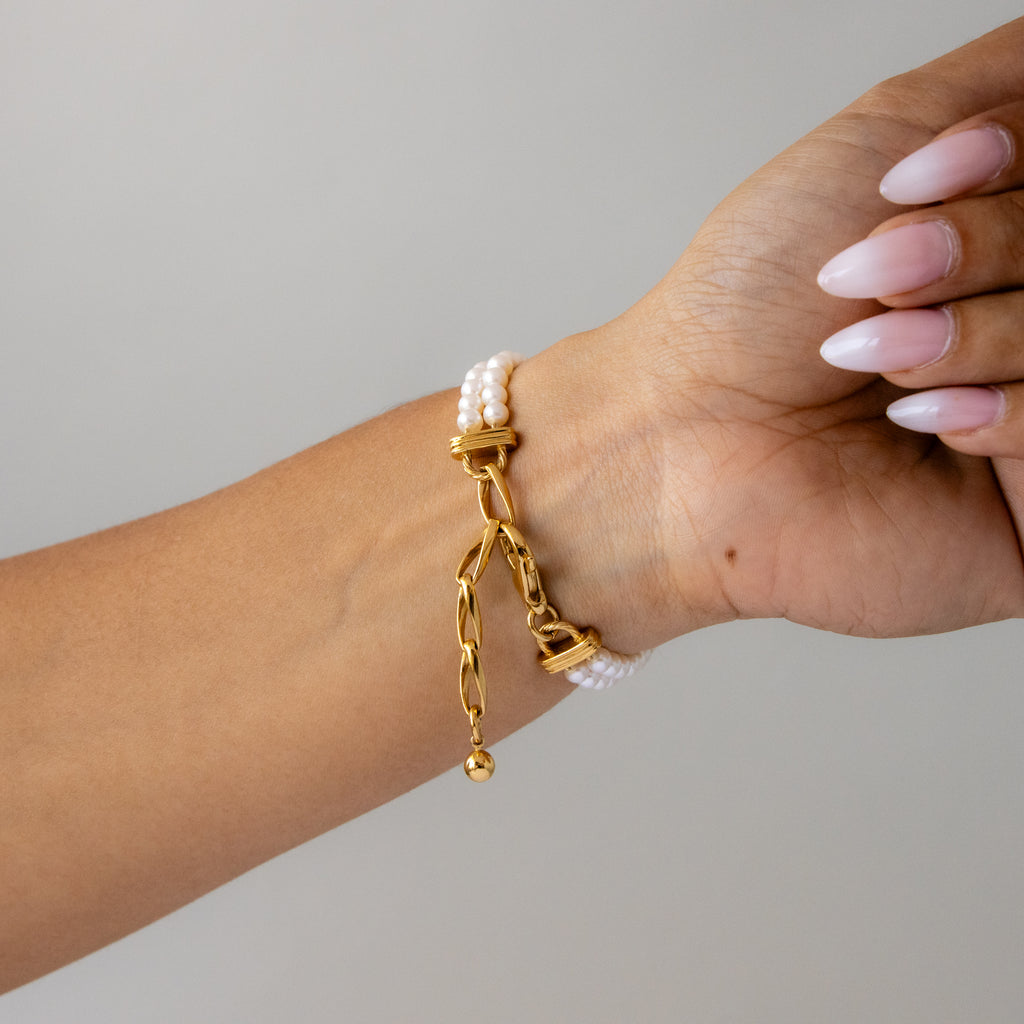 Vintage Taski Oval Pearl Gold Watch