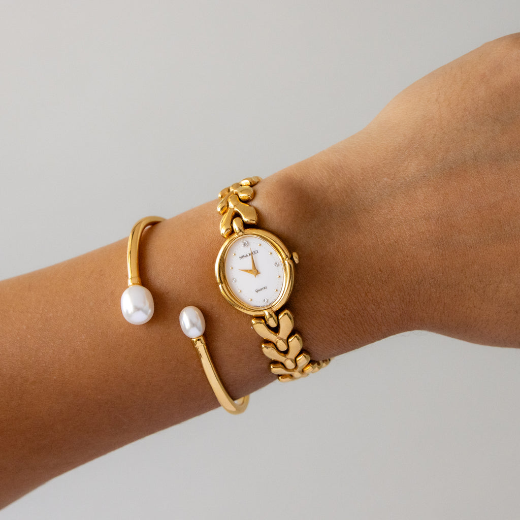 Vintage Nina Ricci Oval Pave Gold Watch