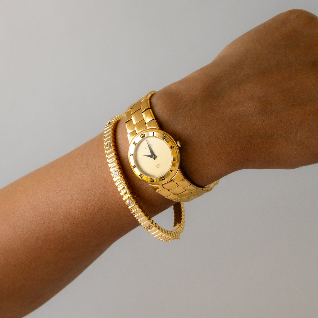Vintage Gucci Swiss Round Bezel Gold Watch