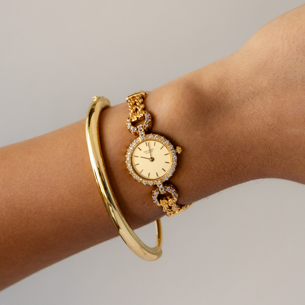 Vintage Technos Swiss Pave Halo Gold Watch