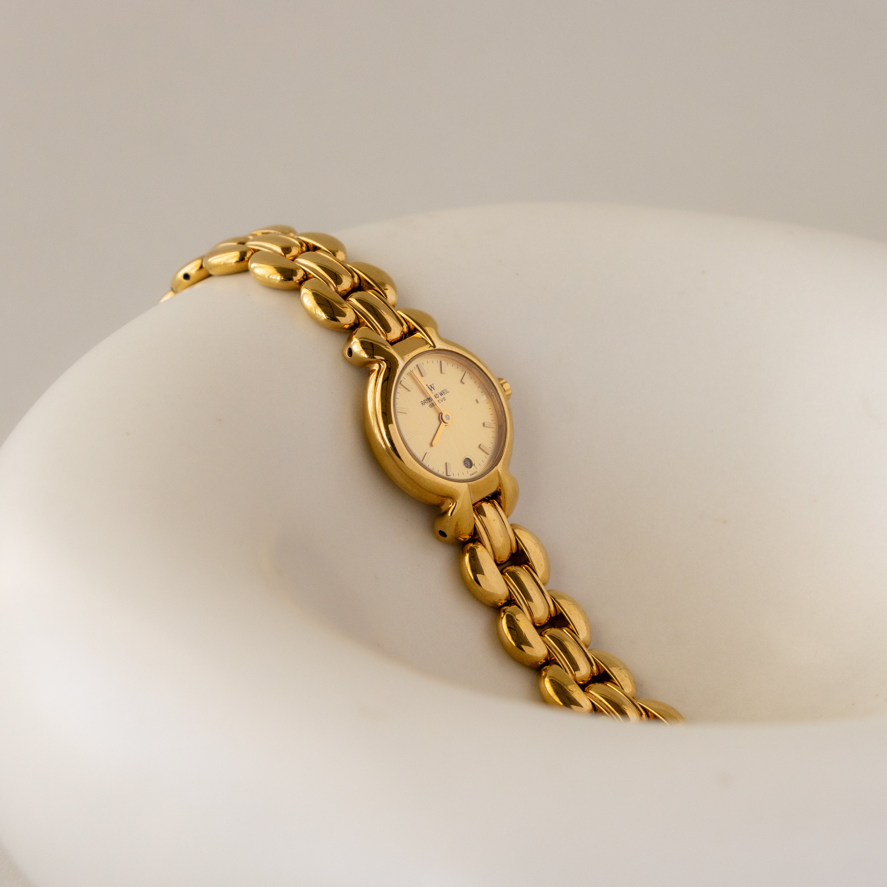 Vintage Raymond Weil Swiss Bubble Gold Watch