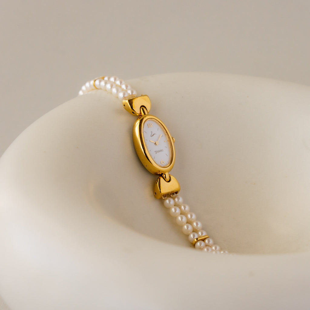 Vintage Taski Oval Pearl Gold Watch