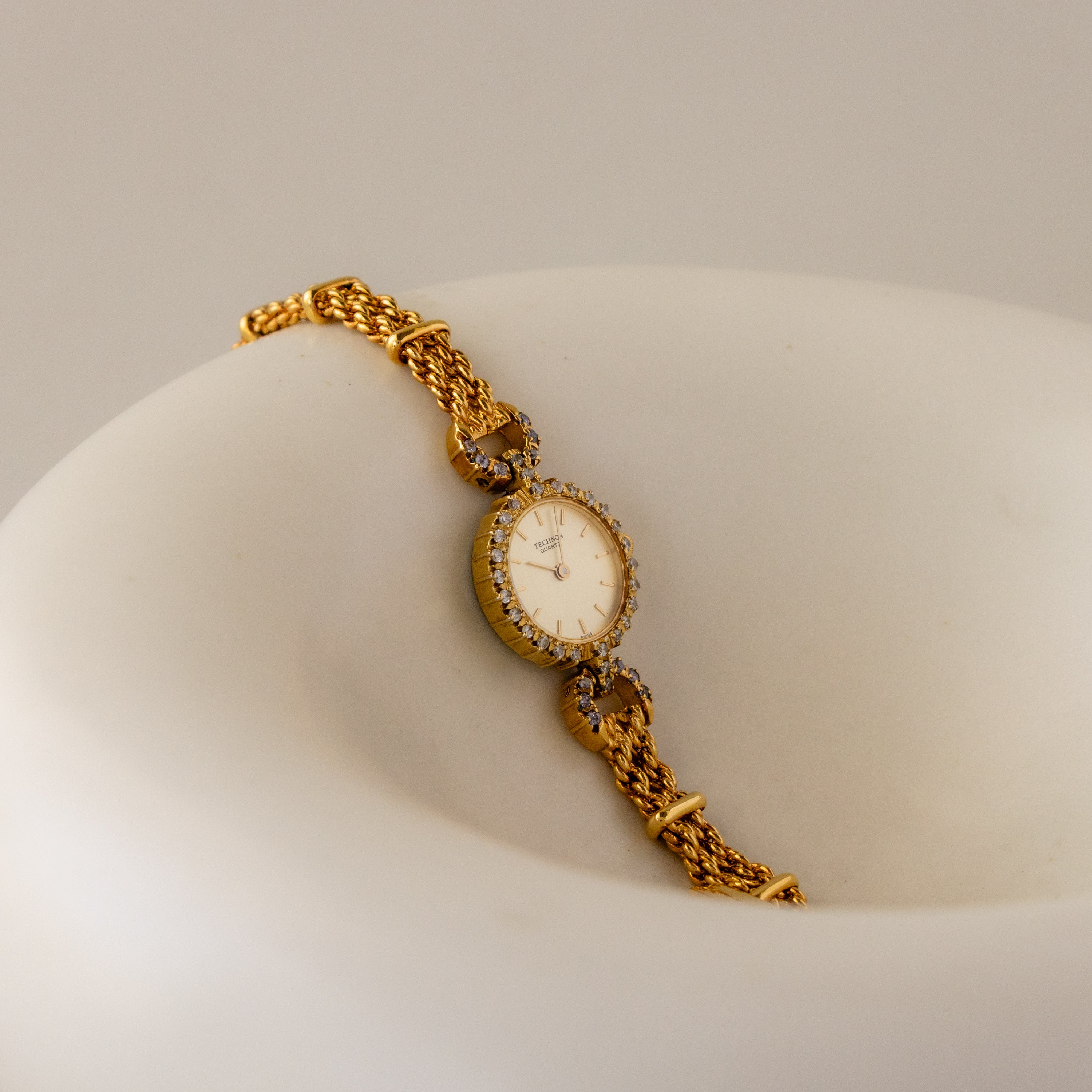 Vintage Technos Swiss Pave Halo Gold Watch