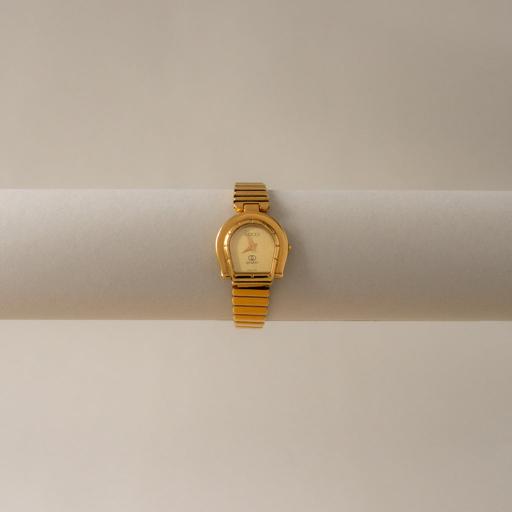 Vintage Gucci Swiss Horseshoe Ribbed Gold Watch