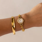 Vintage Technos Swiss Pave Round Gold Watch
