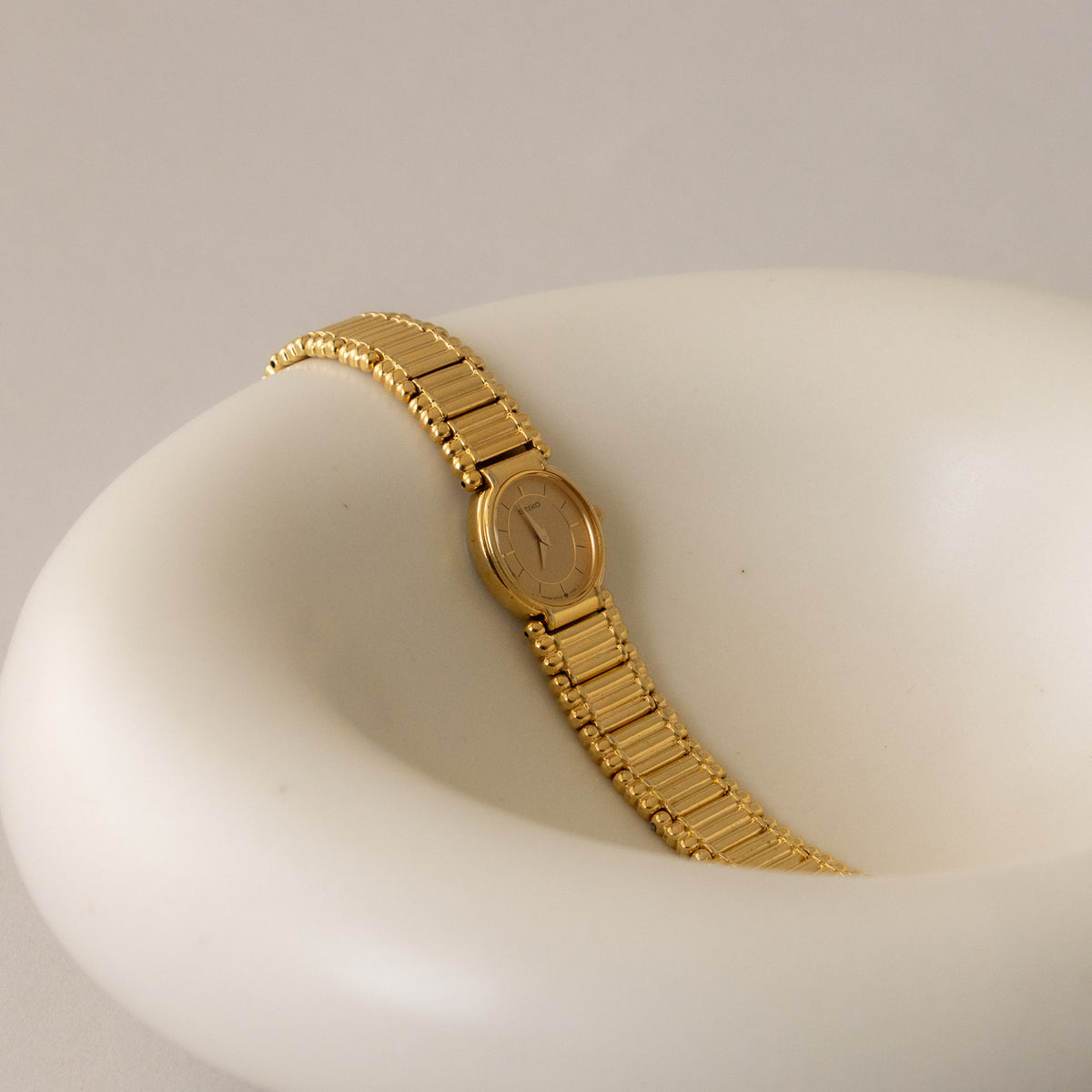 Vintage Seiko Oval Ladder Strap Gold Watch