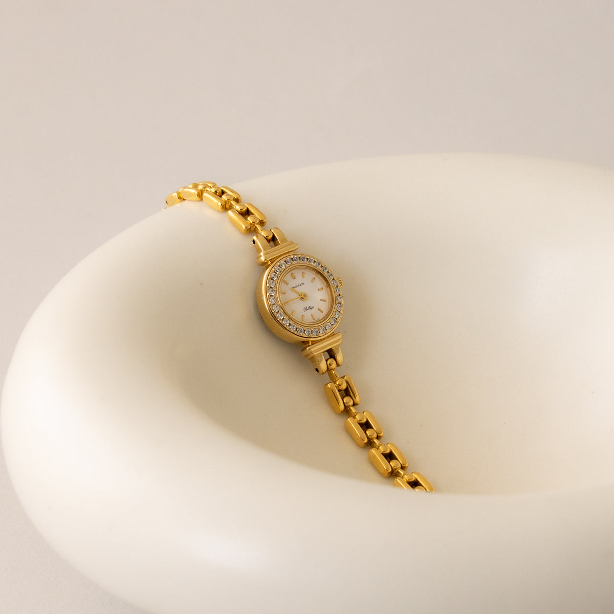 Vintage Technos Swiss Pave Round Gold Watch