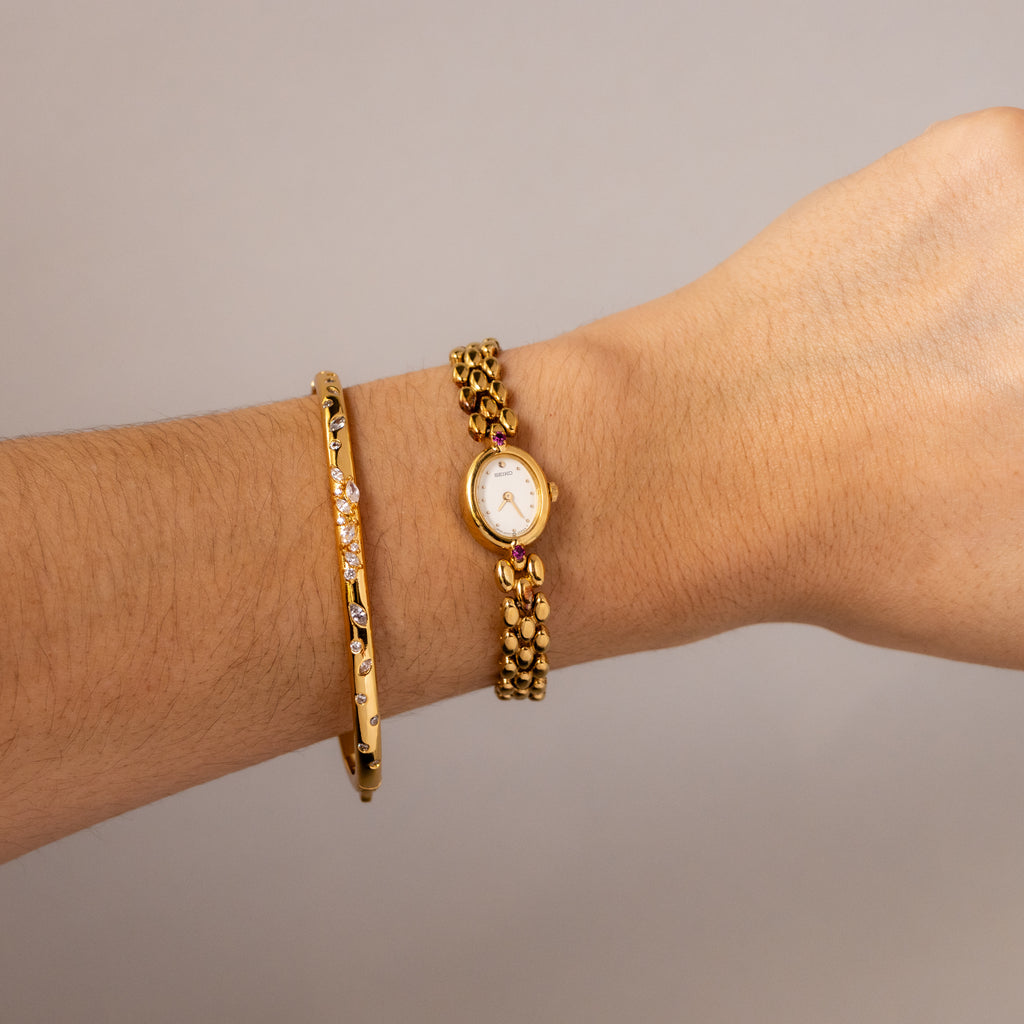 Vintage Seiko Dainty Oval Ruby Beaded Gold Watch