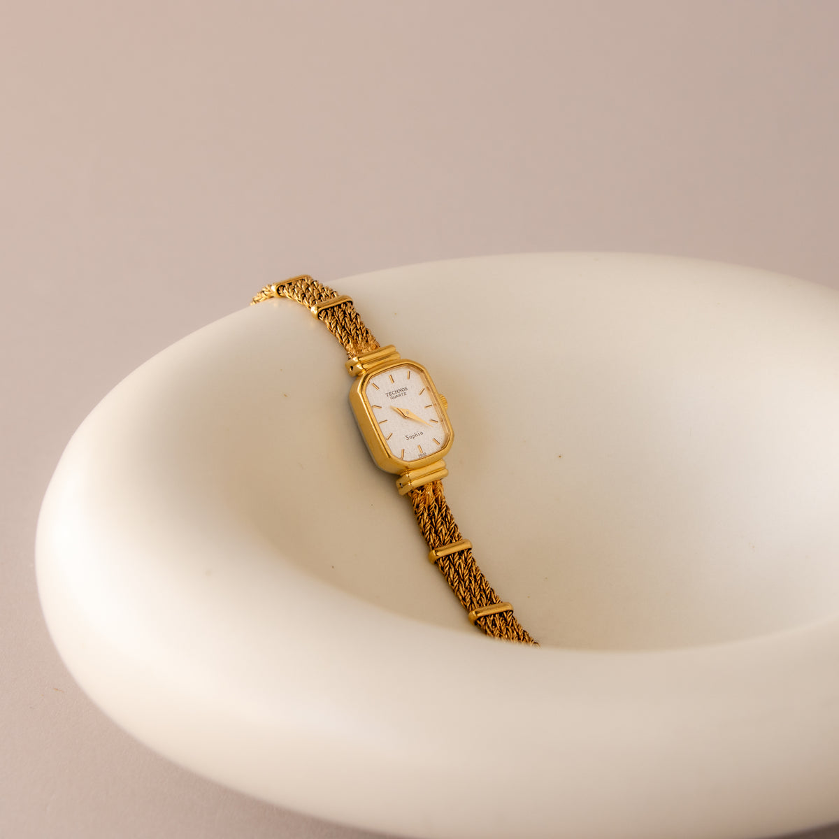 Vintage Technos Swiss Rectangular Rope Gold Watch