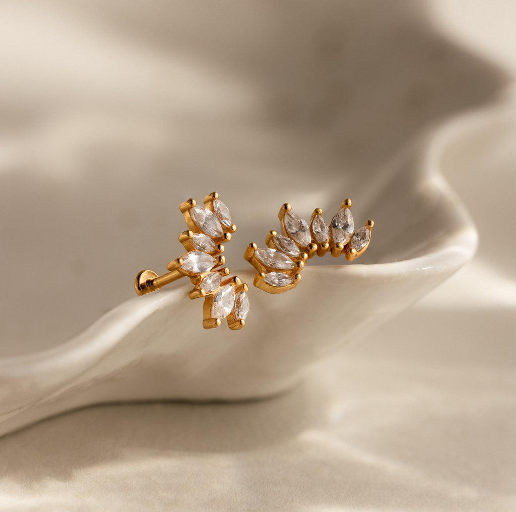 Marquise Diamond Arc Climbers feature clear marquise stones and offer an elegant, delicate look, making these earrings perfect for any occasion.