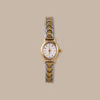 Balance Oval Link Timepiece: gold-tone watch with a minimalist dial and polished two-tone link bracelet.