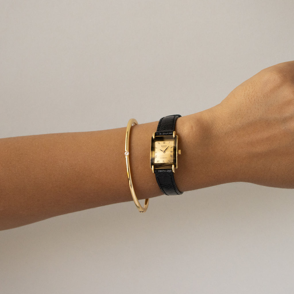 Vintage Rado Rectangular Black Strap Gold Watch