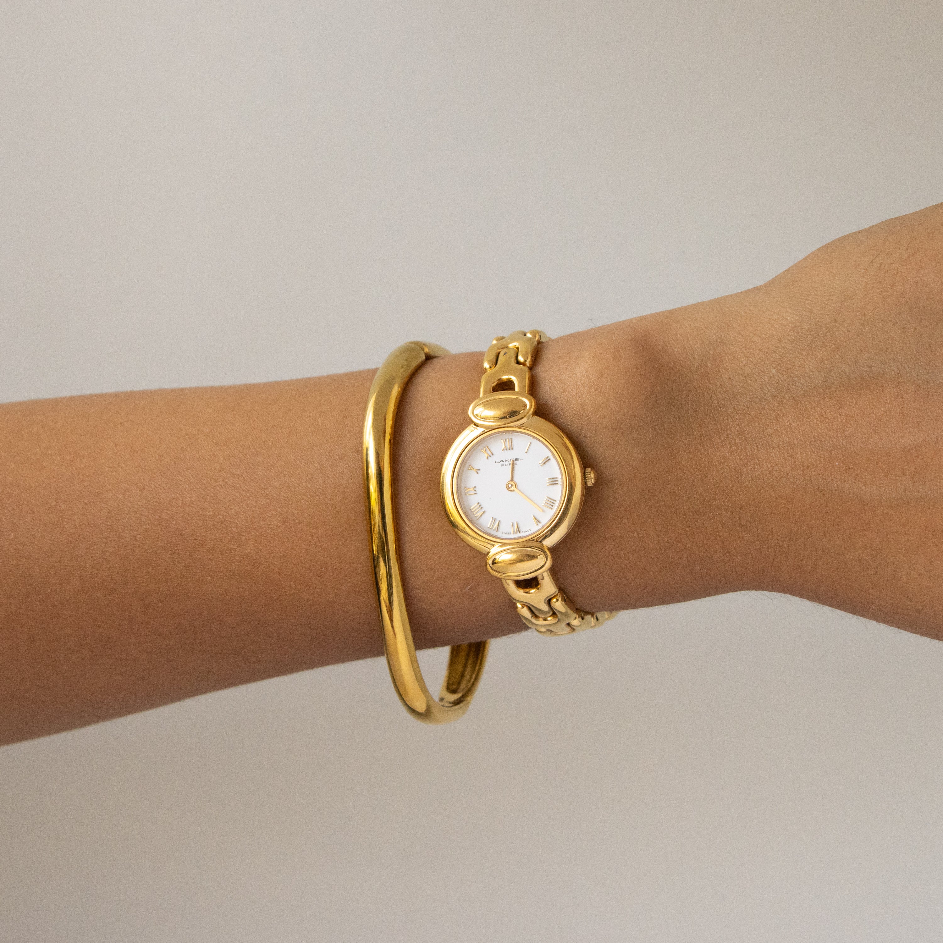 Vintage Lancel Swiss Round Roman Gold Watch
