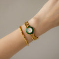 Vintage Courrèges Swiss Bezel Gold Watch