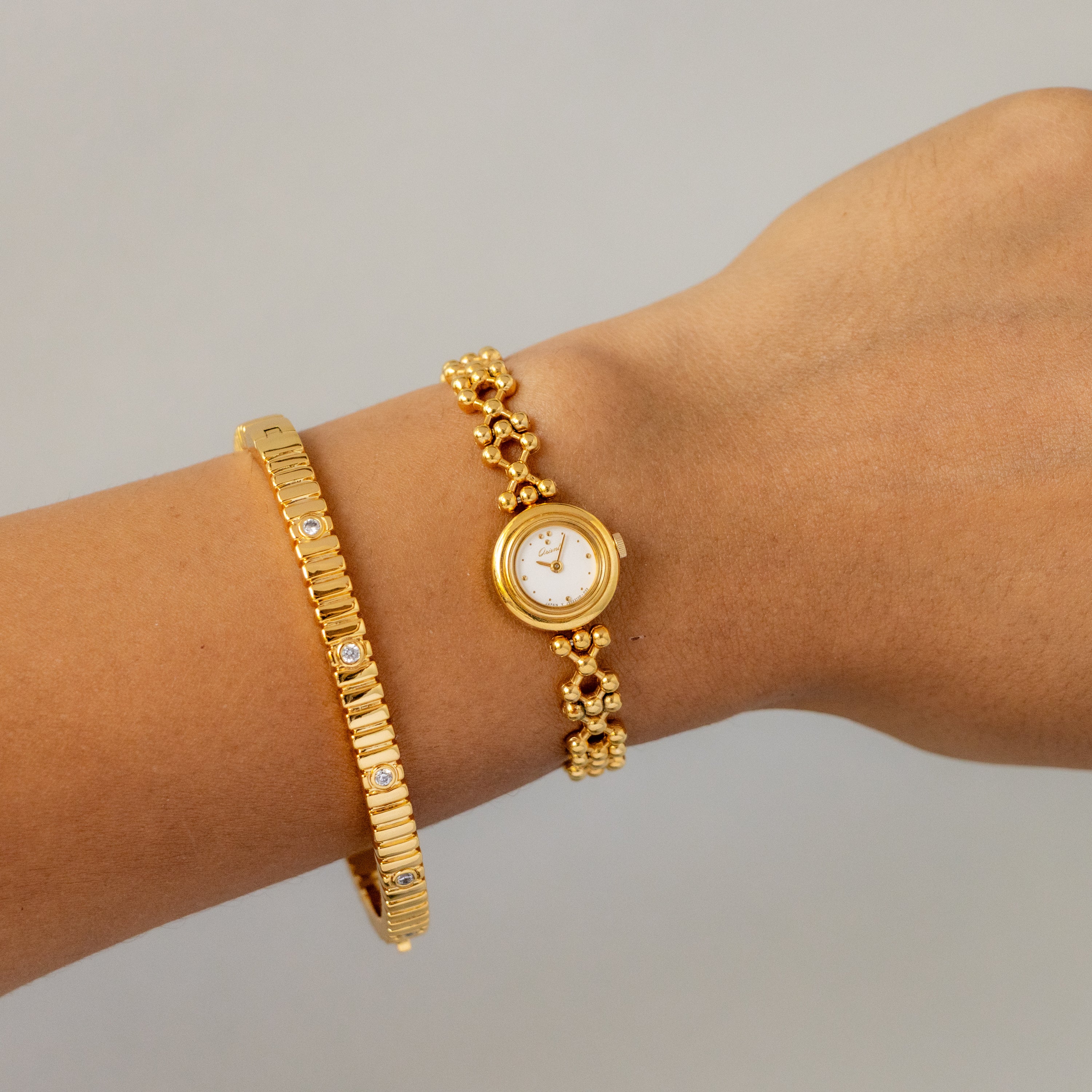 Vintage Orient Round Beaded Gold Watch