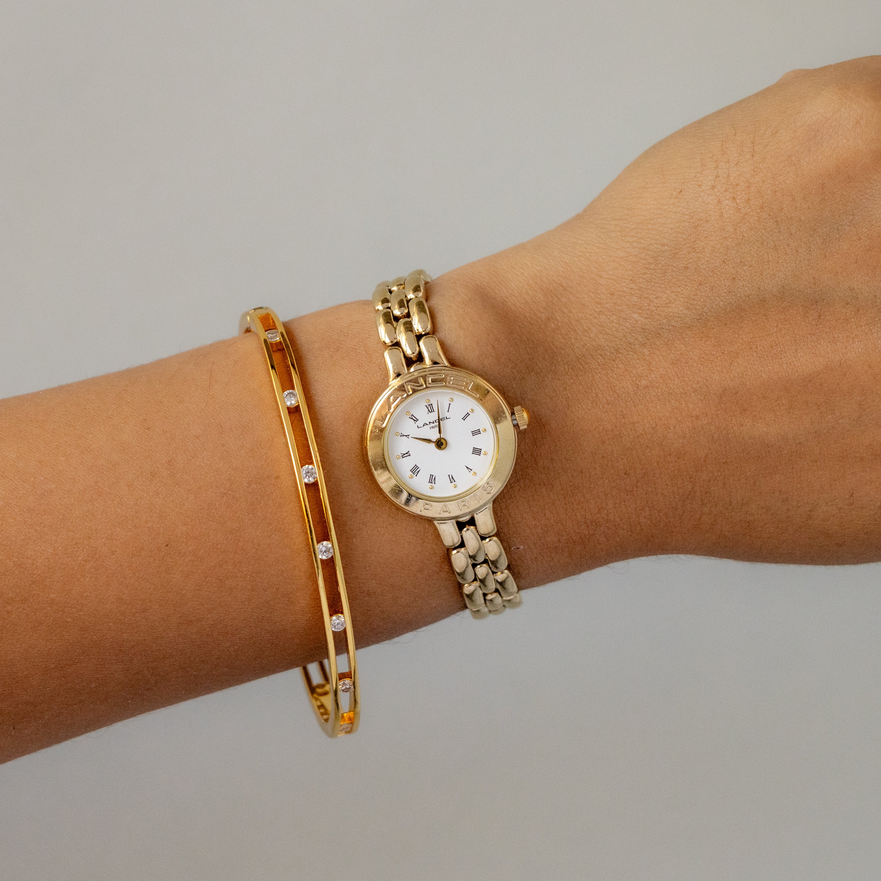Vintage Lancel Round Paris Gold Watch