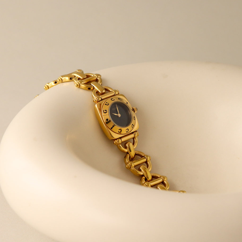 Vintage Gucci Swiss Midnight Horsebit Gold Watch
