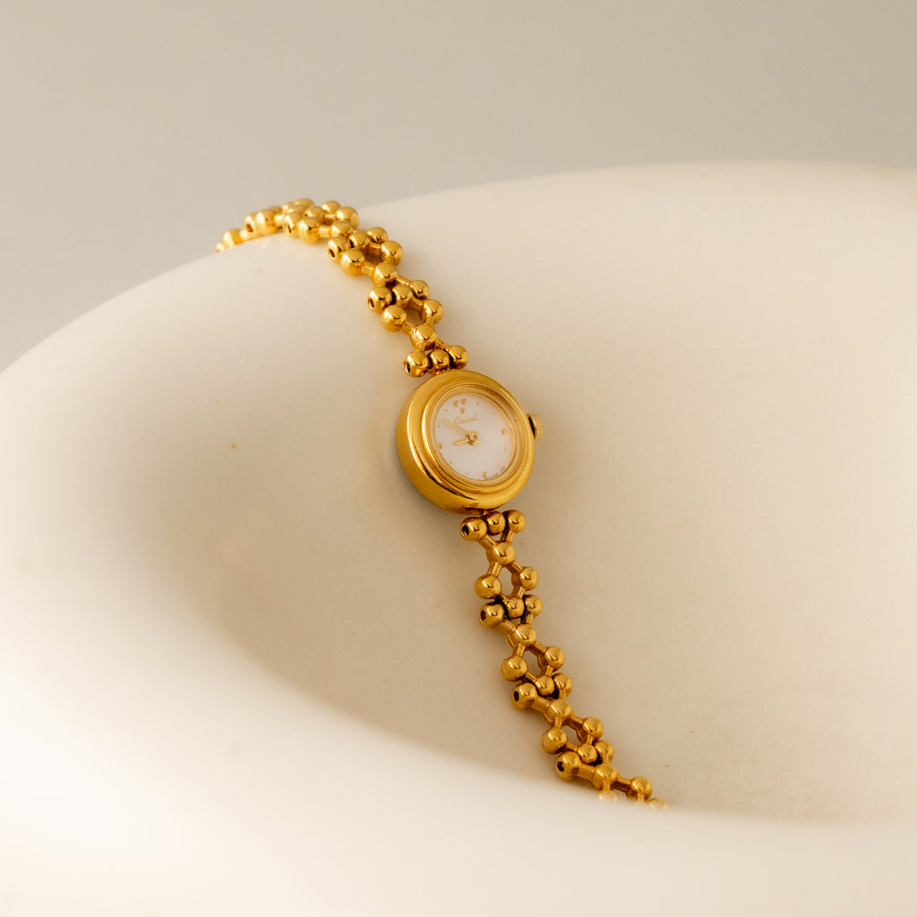 Vintage Orient Round Beaded Gold Watch