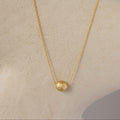 Textured Globe Charm Necklace