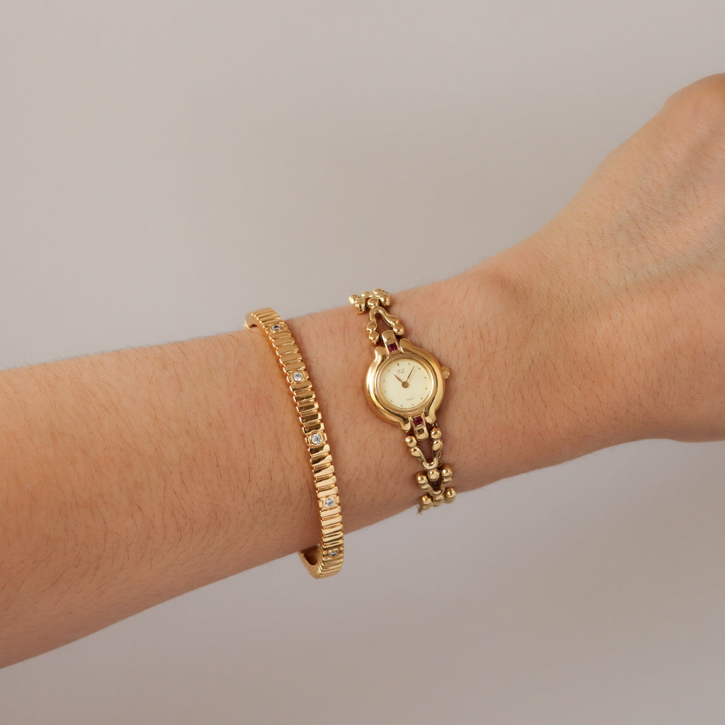 Vintage Vega Round Ruby Gold Watch