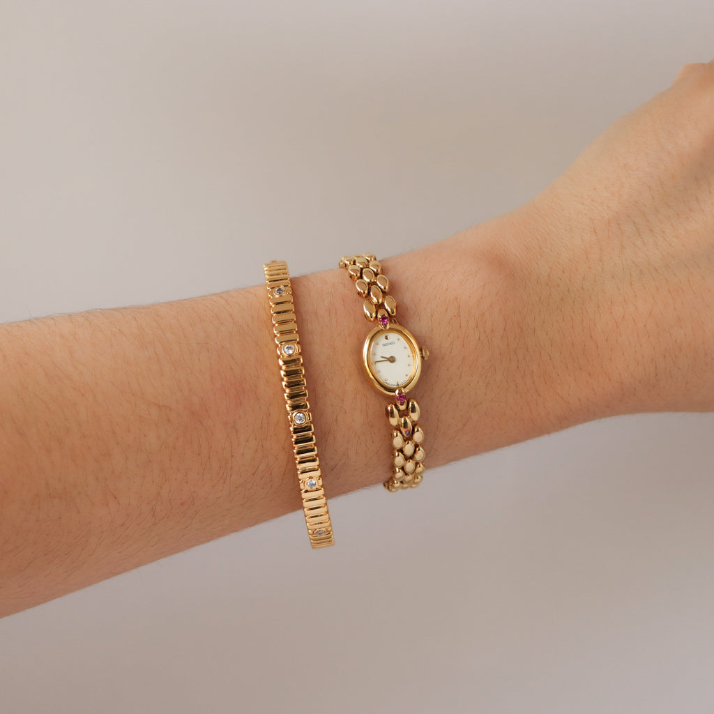 Vintage Seiko Oval Ruby Beaded Gold Watch