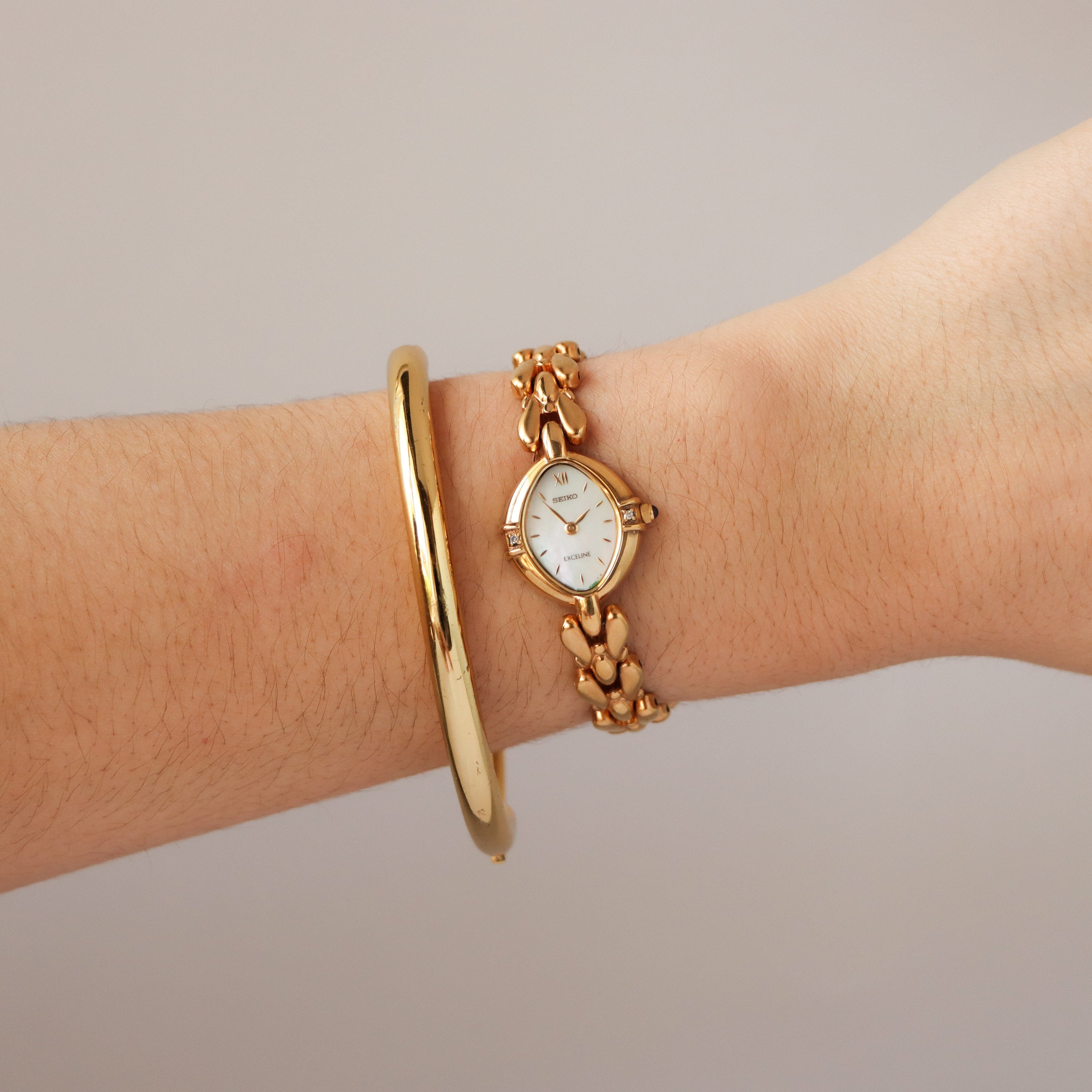 Vintage Seiko Exceline Oval Pearl Gold Watch