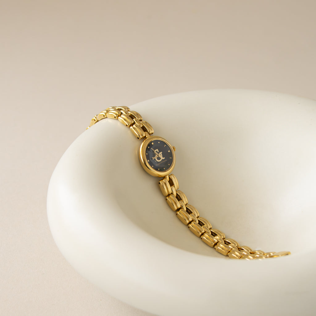 Vintage Pinky & Dianne Midnight Gold Watch