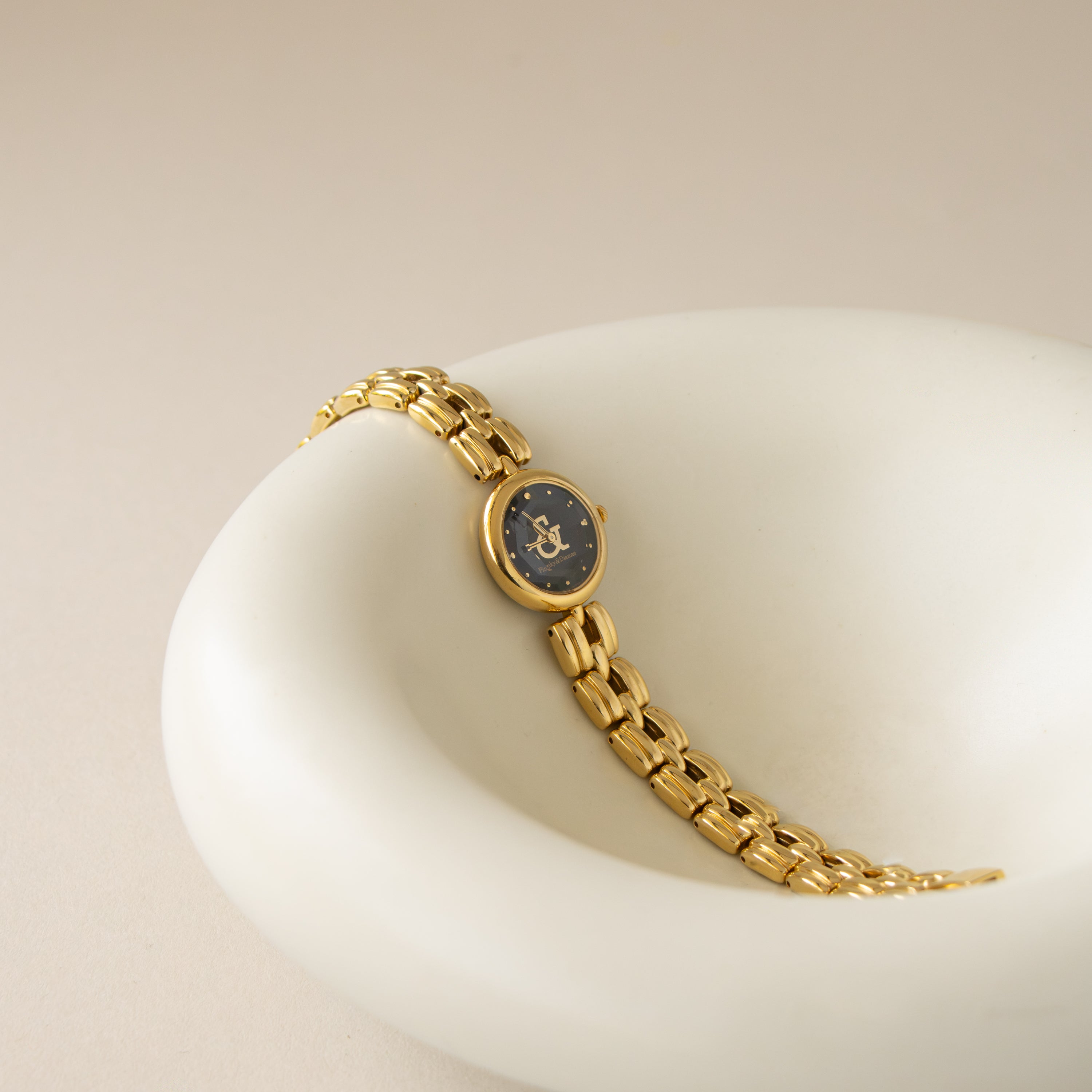 Vintage Pinky & Dianne Midnight Gold Watch
