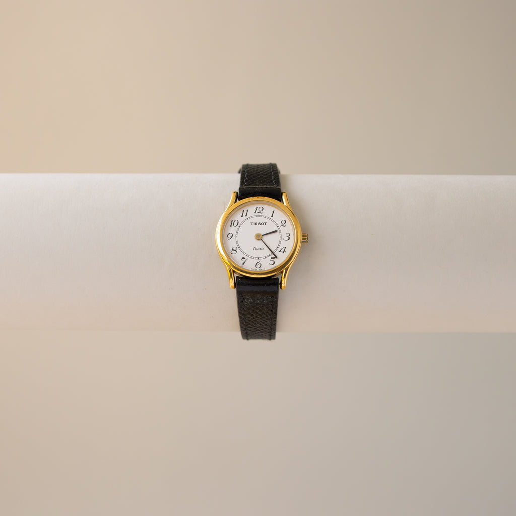 Vintage Tissot Round Black Strap Gold Watch