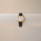 Vintage Tissot Round Black Strap Gold Watch