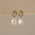 Opulent Diamond & Baroque Pearl Studs