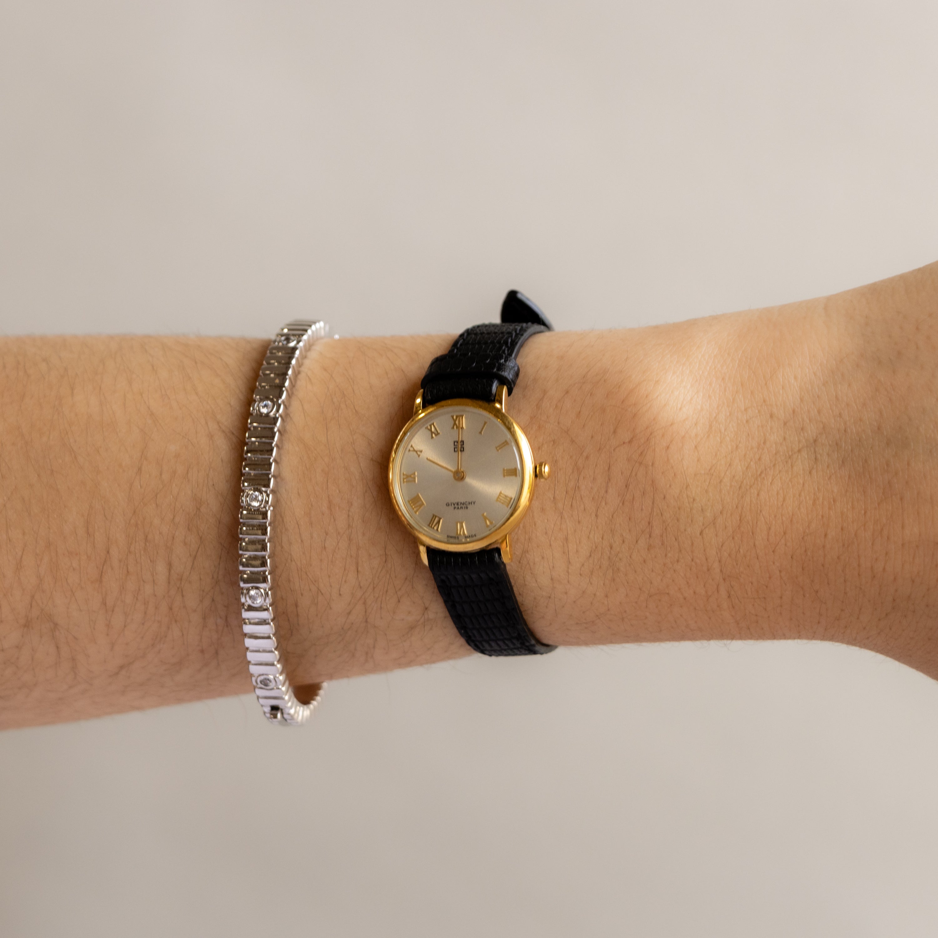 Vintage Givenchy Swiss Roman Black Strap Gold Watch