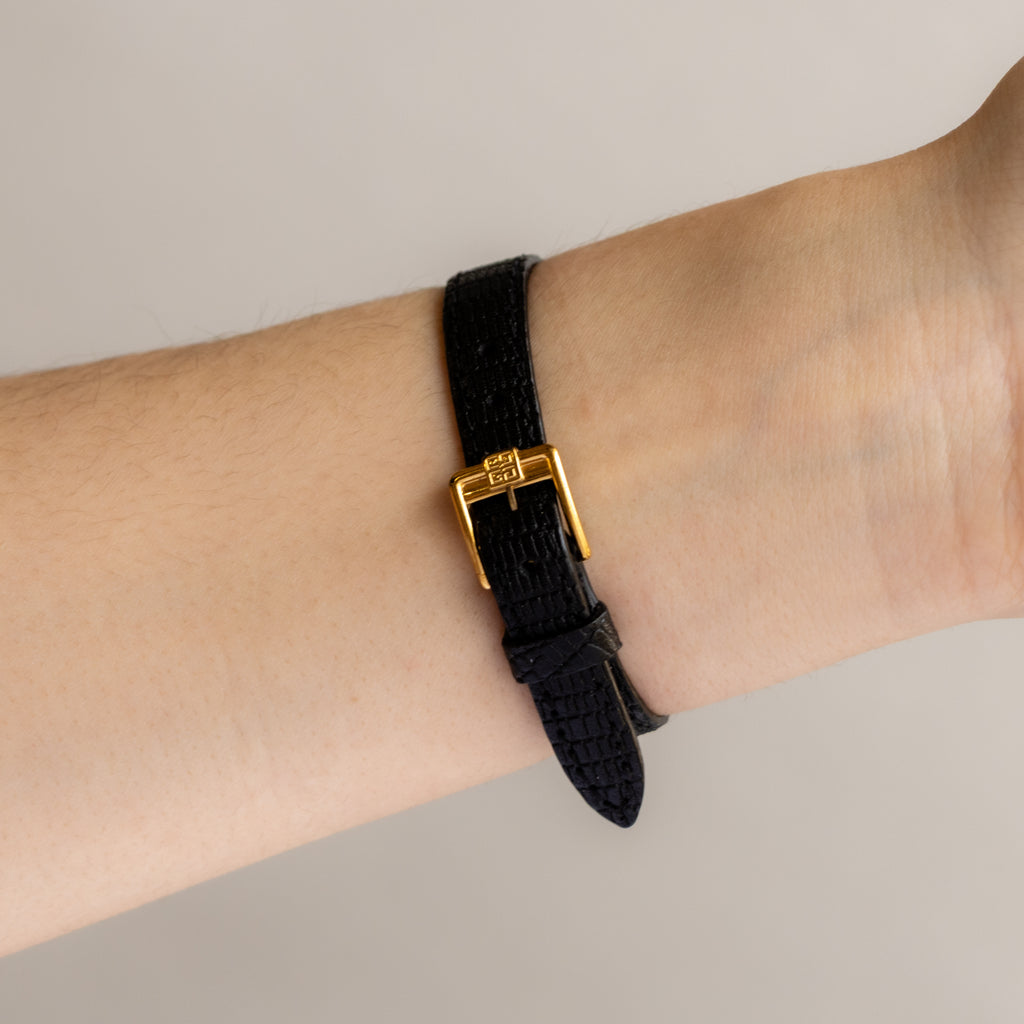 Vintage Givenchy Swiss Roman Black Strap Gold Watch