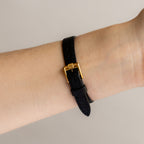 Vintage Givenchy Swiss Roman Black Strap Gold Watch