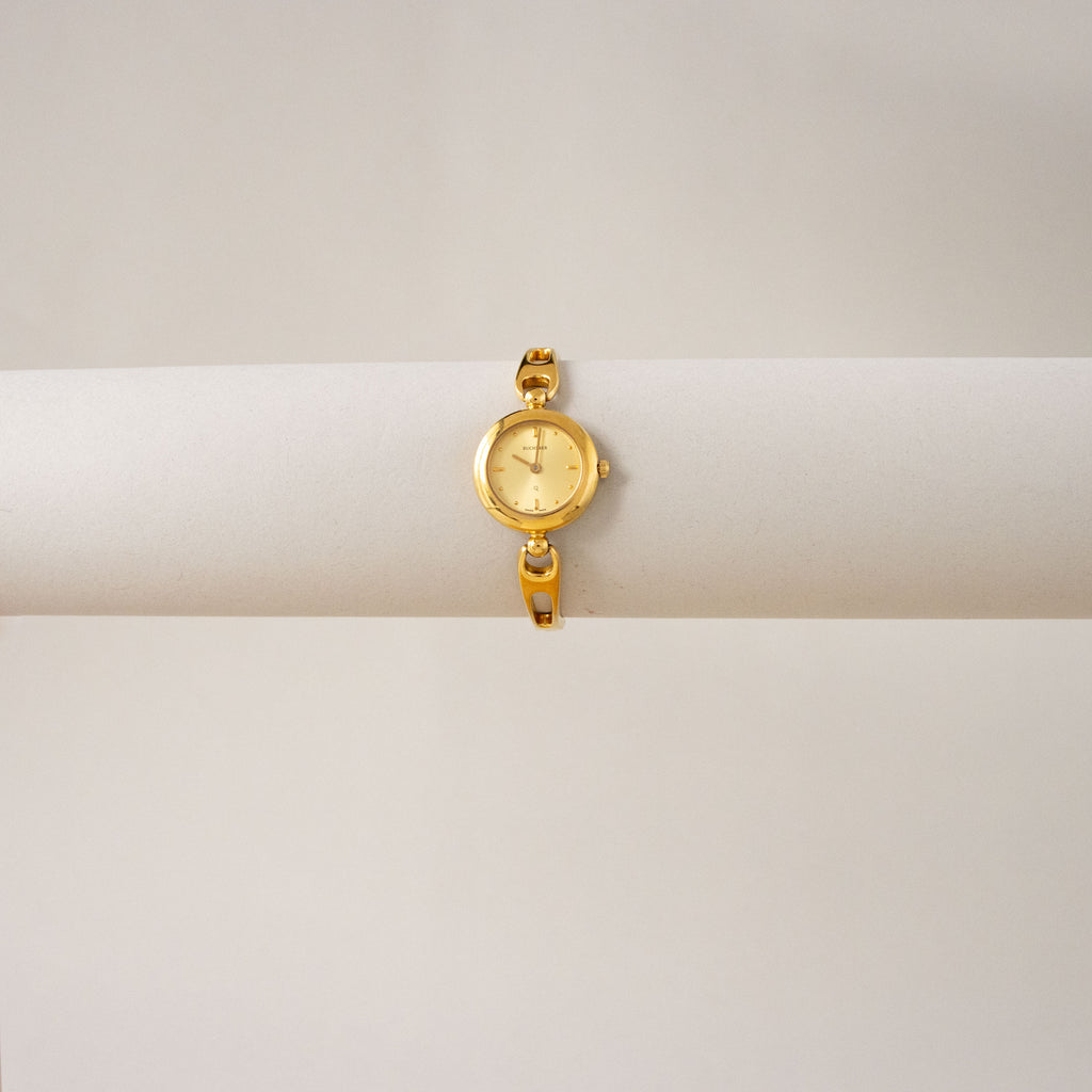 Vintage Bucherer Swiss Slim Round Gold Watch