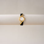 Vintage Courreges Round Black Strap Gold Watch