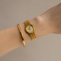 Vintage Technos Swiss Brushed Gold Watch