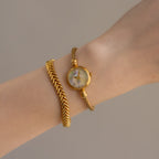 Vintage Gucci Swiss Shell Coil Gold Watch