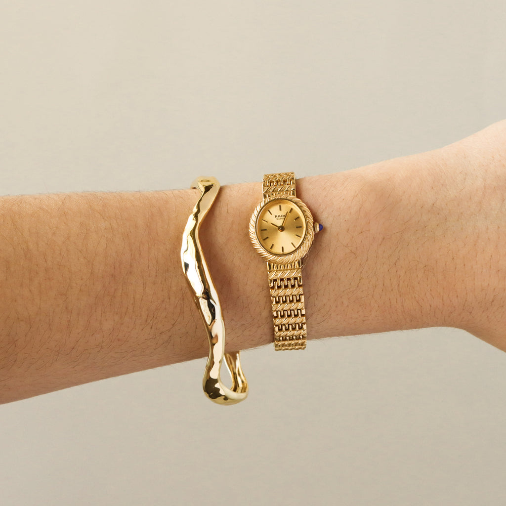 Vintage Rado Oval Twist Gold Watch