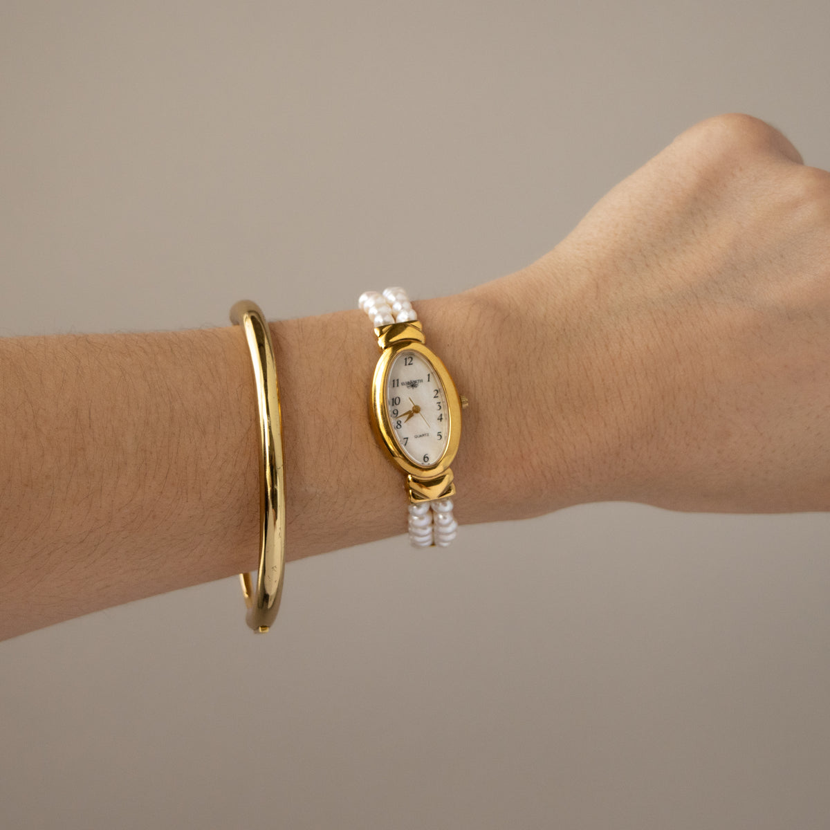 Vintage Elizabeth Oval Pearl Gold Watch